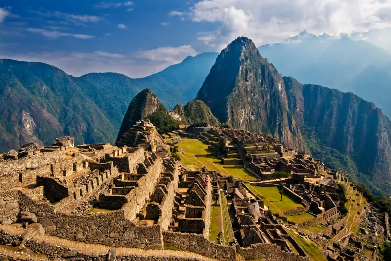 Machu Picchu at dawn: the citadel and Huayna Picchu fill the view, with no one in sight.